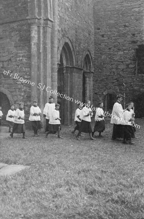 CEREMONY ACOLYTES IN ABBEY